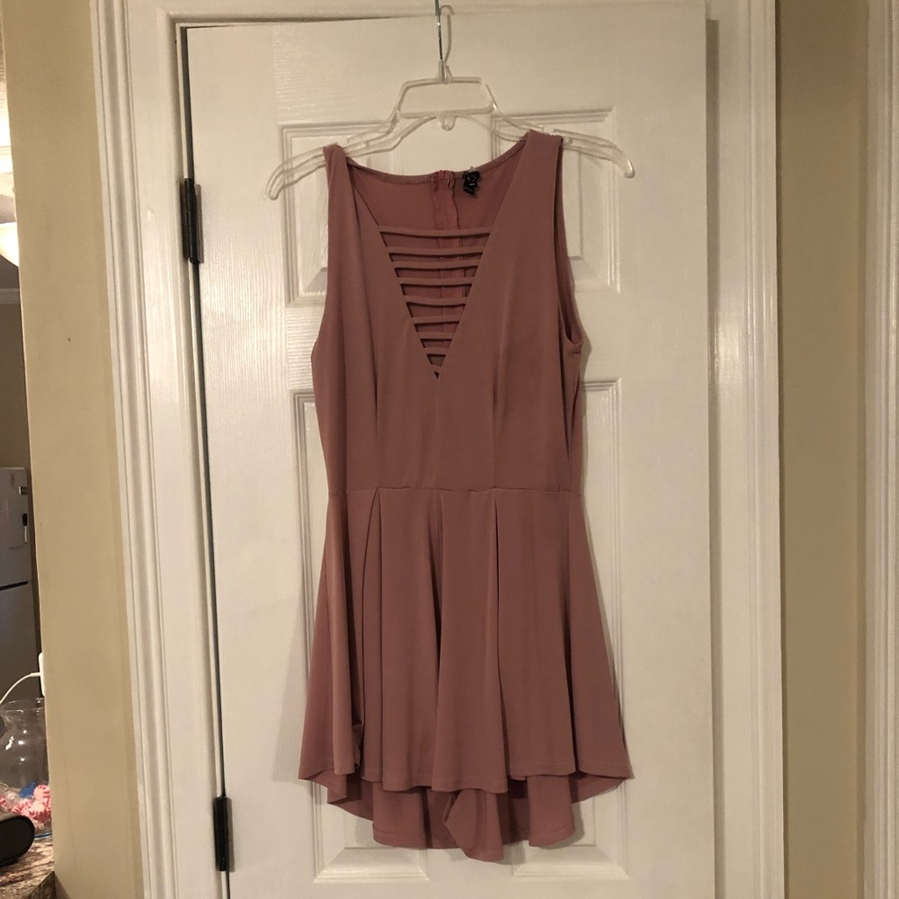 Pink romper. Size M/L.